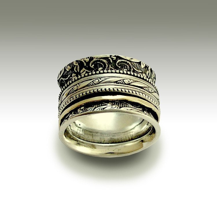 Sterling silver stacking band with silver and gold spinners - In my heart.