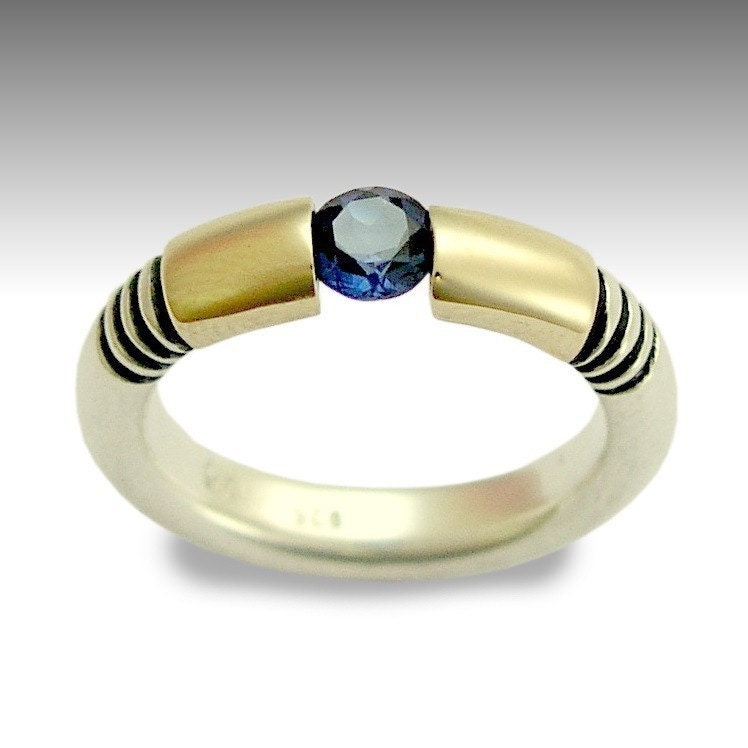 Engagement stone tension ring - Silver and gold with blue sapphire gemstone band - Unexpected