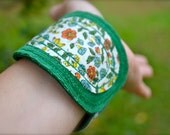 green and blue fiber art bracelet cuff