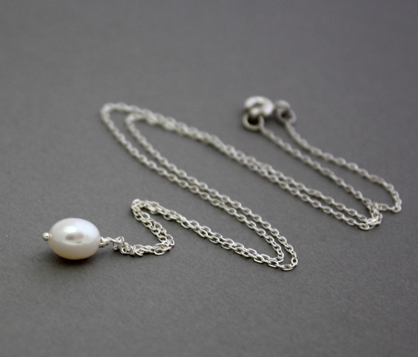 Petite solitaire white pearl necklace on sterling silver chain