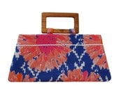 Handbag with summer flowers on ikat blue