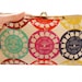 Clutch purse with viewfinder slides