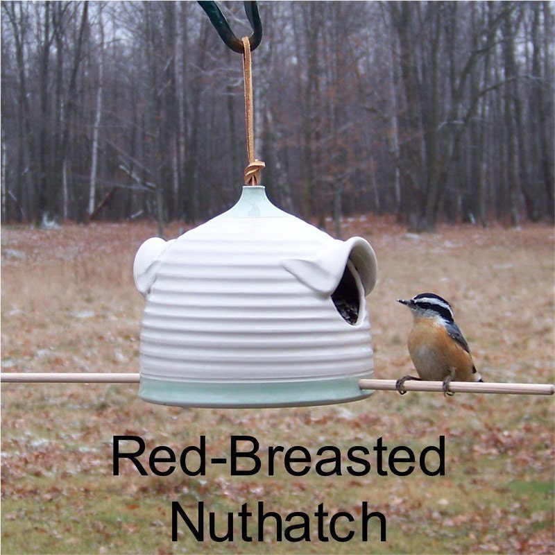 Pottery Bird Feeder in Warm Brown and Brown for feeding sunflower seeds to your favorite birds