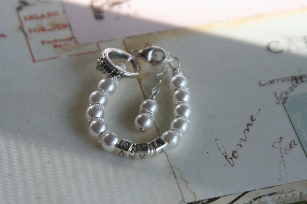 child's chunky style. Elegant Pearl Princess Heirloom Bracelet with personalization and charm