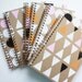 triangle notebook no. 2 ... white, pink, orange, and black on kraft