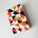 triangle jotter ... with navy, orange, and pink