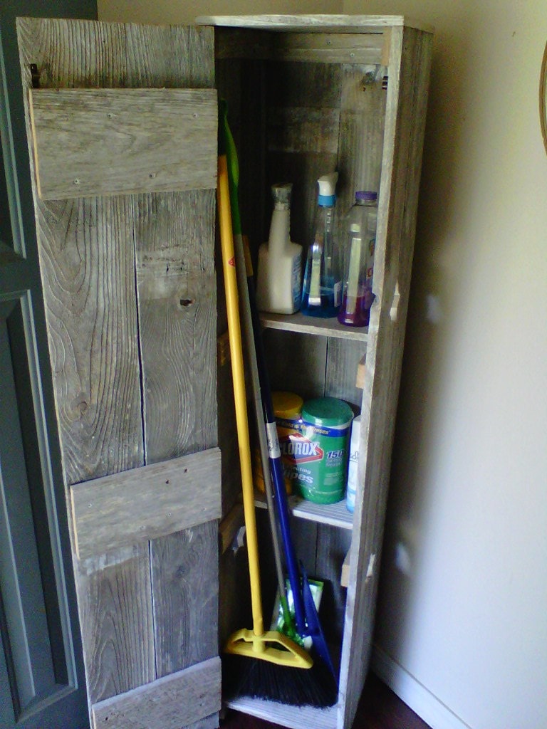Tall Broom Closet. Storage Pantry. Laundry Room Cabinet. Cleaning supplies. Kitchen. Distressed White Home Decor Stars Are Optional.