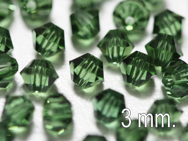 50 pcs. Swarovski Crystal Bicone Green Tourmaline 3 mm.