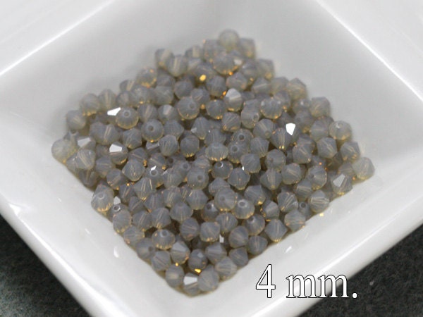 100 pcs. Light Grey Opal Swarovski Crystal Bicone 4 mm. 5301