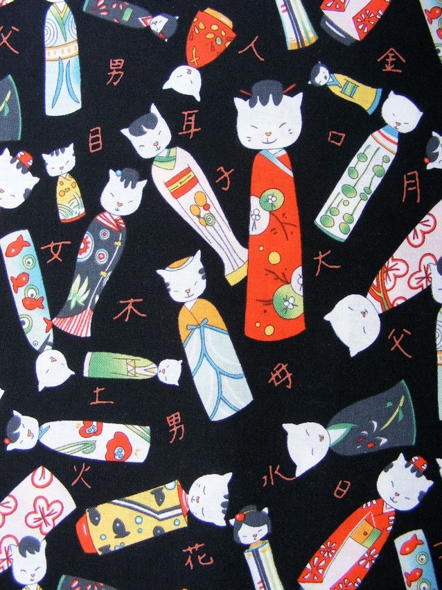 Alexander Henry Kitty Kokeshi cotton fabric yardage black