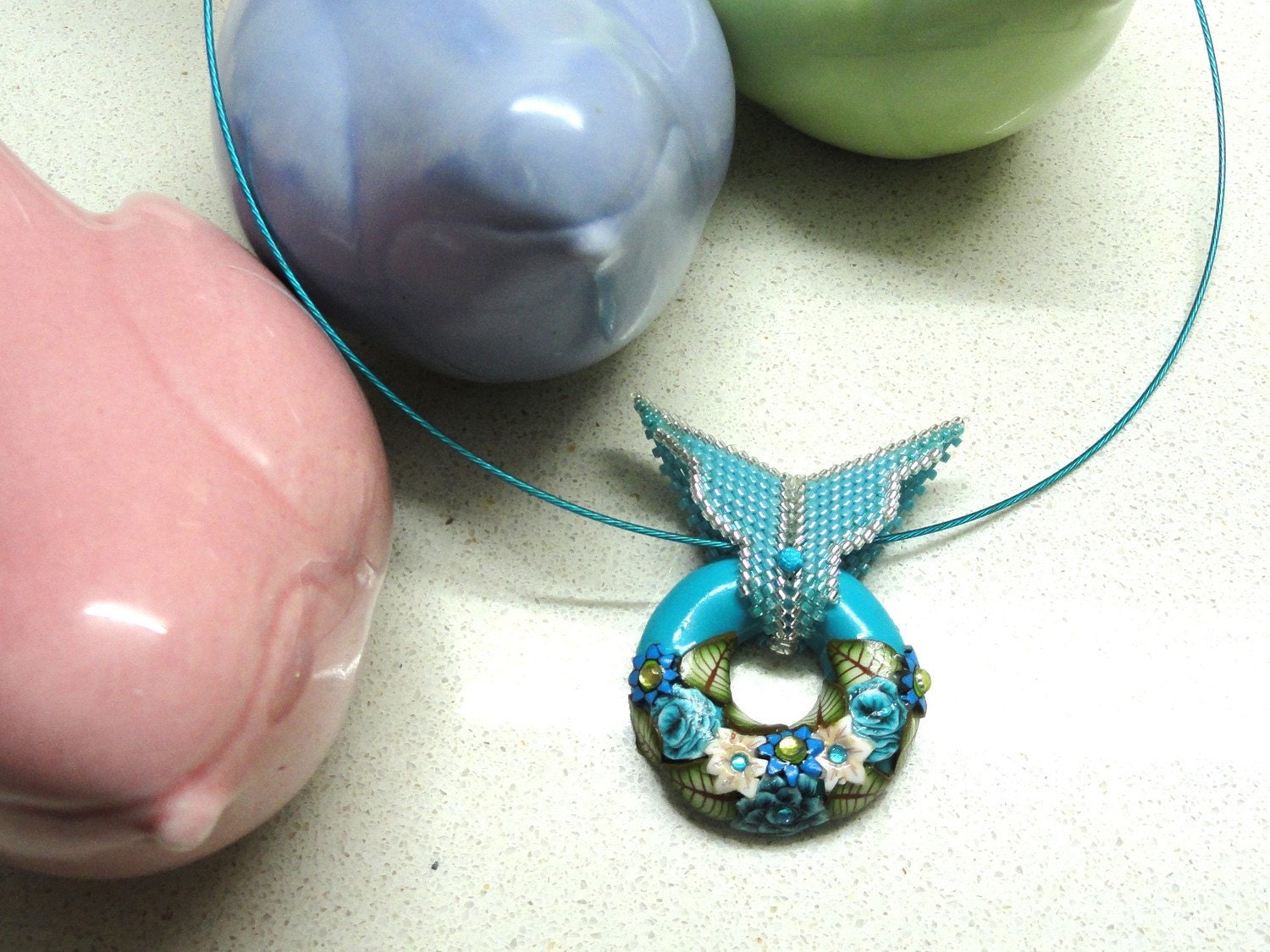 Jewelry Pendant Handmade of Polymer clay in Bagel Shape. Turquoise Beadwork by Artefyk
