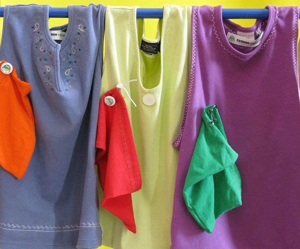 Choose 4 T-Shirt or 5 Hand-Held Bags (each with a free wristlet)