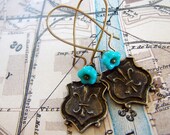 Marchioness . French Crest, Aqua Bellflowers, and Aged Opulence