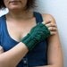 Green fingerless gloves , mittens with an owl pattern