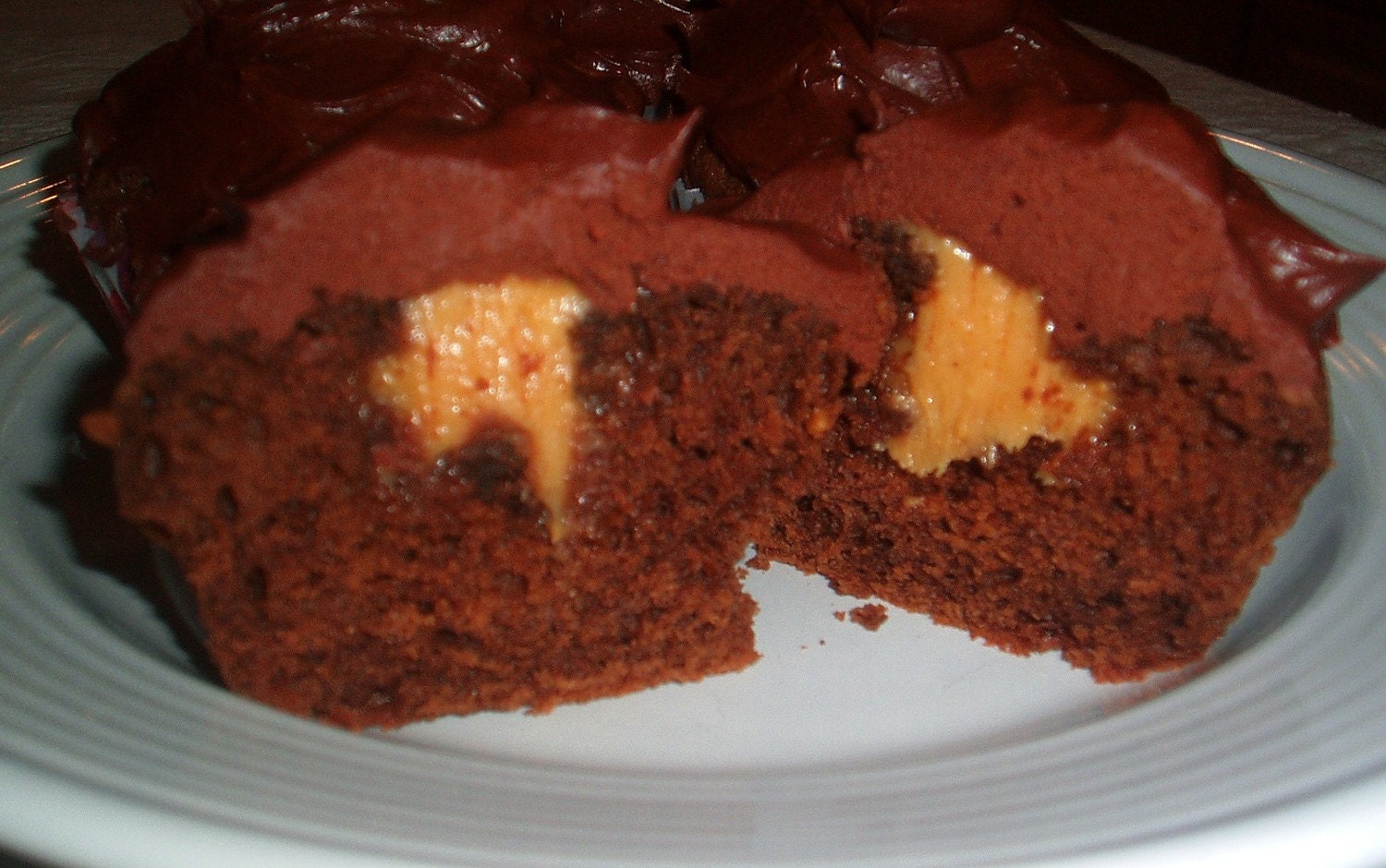 6 Chocolate Peanut Butter Cupcakes w/Chocolate Frosting and filled w/Peanut butter Frosting