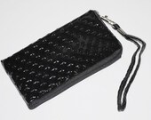 Black Star faux leather wristlet