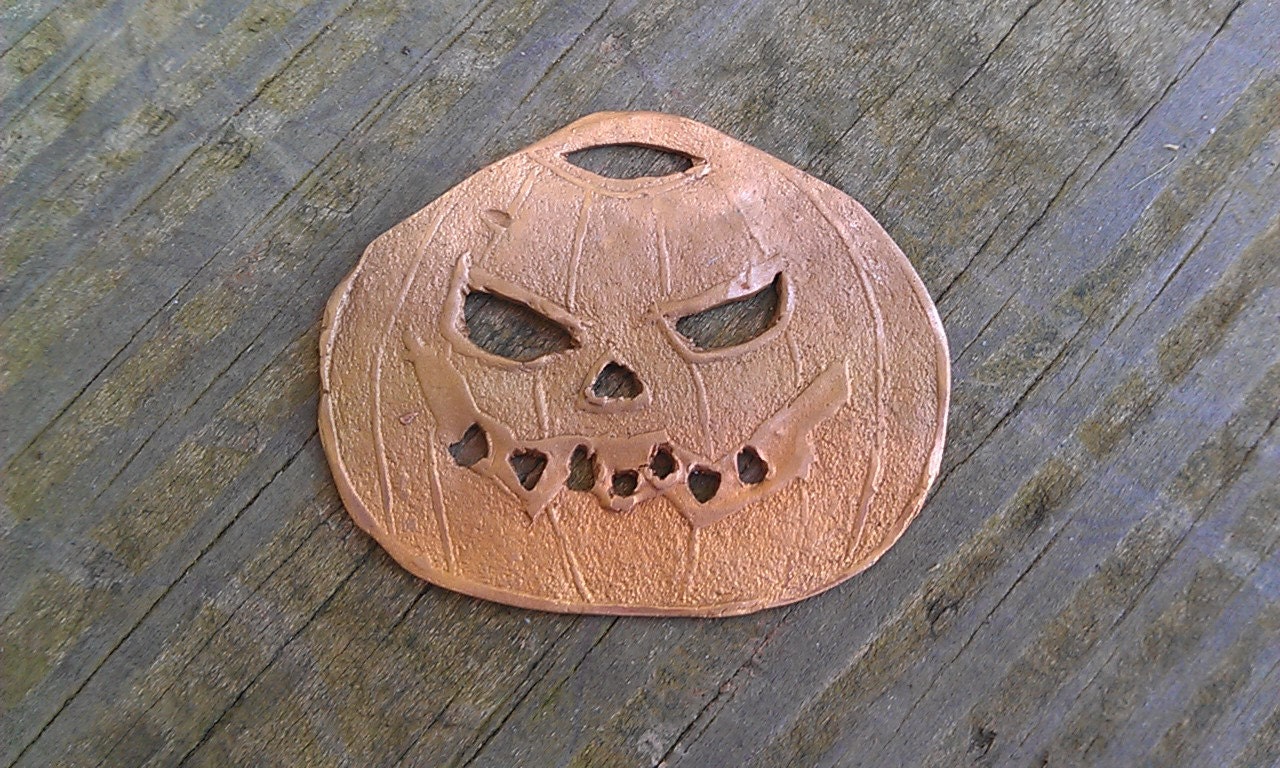 Pumpkin pendant in bronze