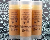 WITCHES BREW Solid Perfume with Cocoa Butter and Vitamin E - .15oz Oval Tube (patchouli, cinnamon, clove, cedar)