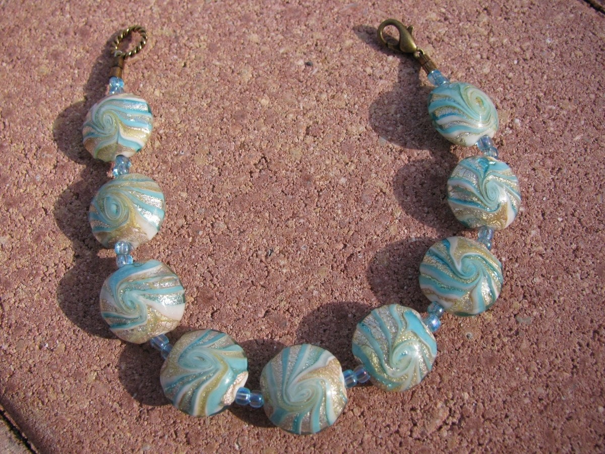 Aqua Swirl Bracelet with Foil Lentil Beads