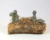 Ceramic Squirrels on a Log