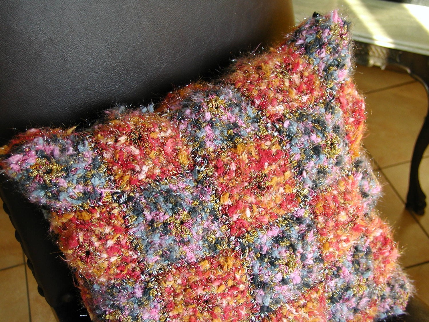 MultiColor and MultiYarn Fiber Art Chunky Pillow, multicolor in shades of red, gold, gray and pink