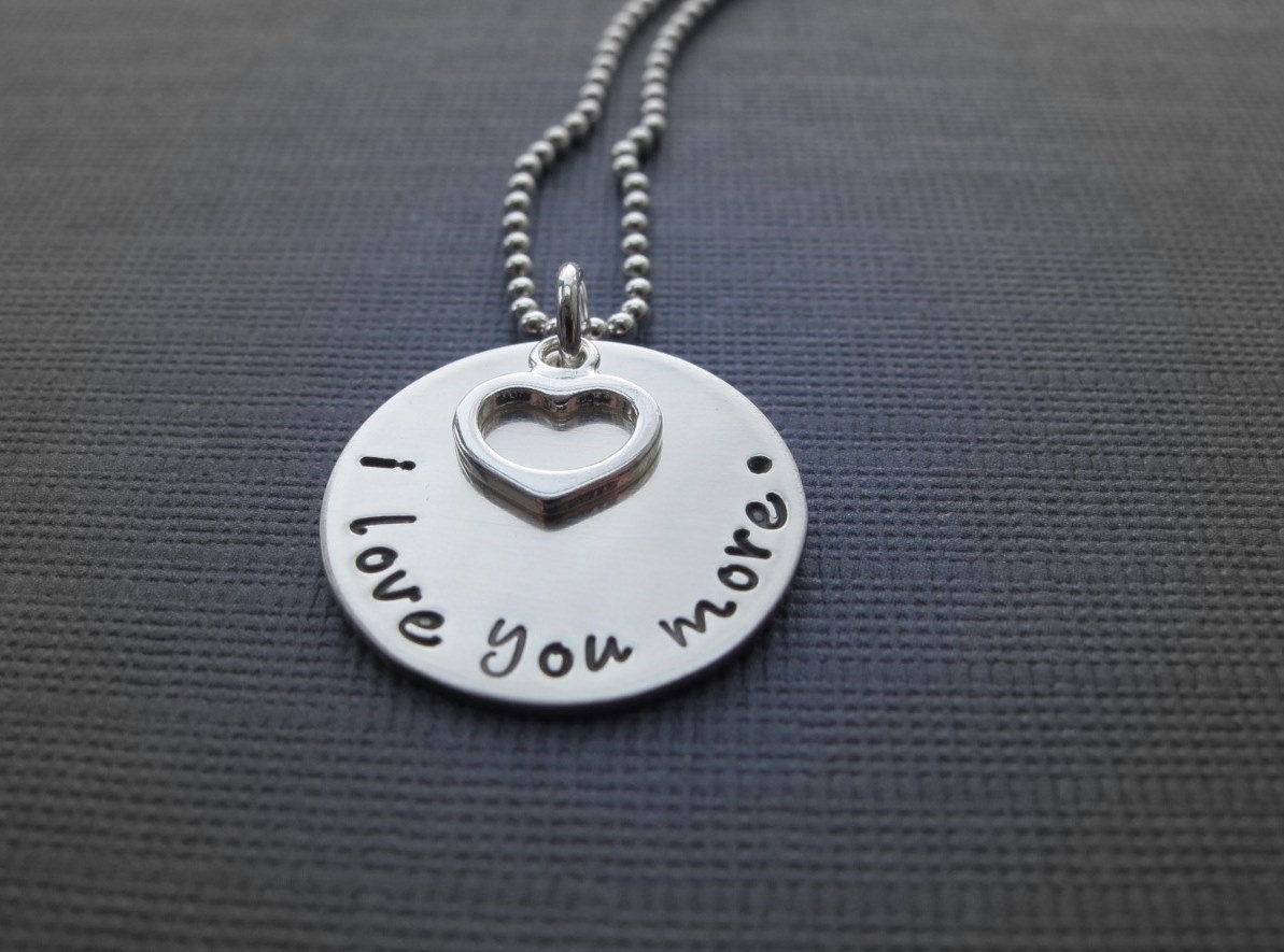 Hand Stamped Jewelry I love you more necklace in fancy lowercase font with open heart