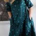 green silk embroidered spot dress