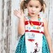 Dr. Seuss knot petal dress and ruffled striped pants