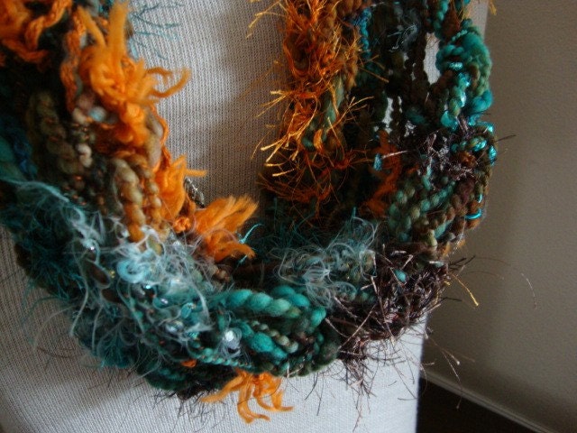 Mobius twist scarf, crocheted cowl, handspun art yarn with suede faux fur accents