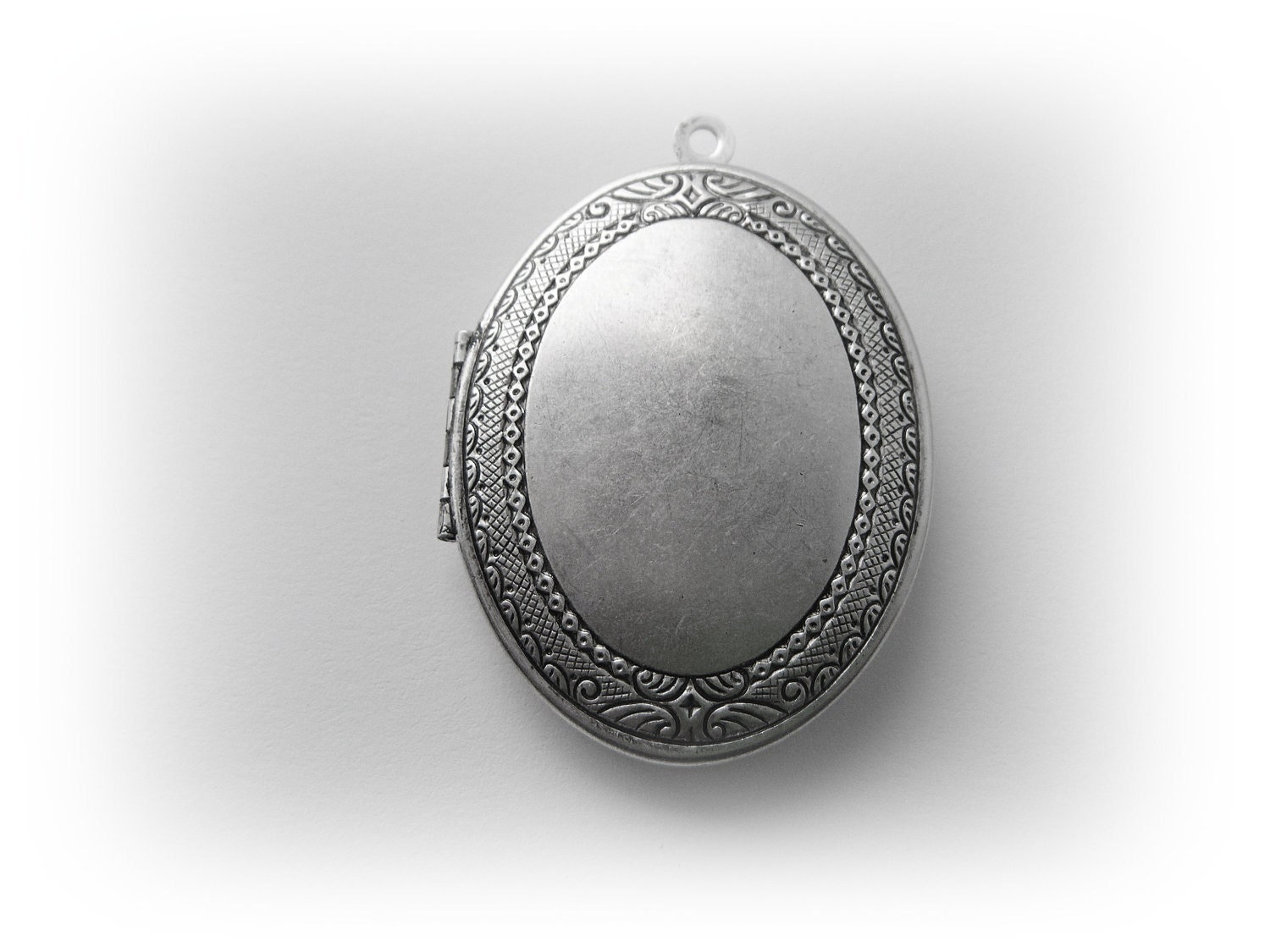 Oval Raised Edge Locket Pendant Silver Ox Brass