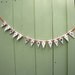 Porcelain Happy Christmas Garland, real gold lustre, red ribbon