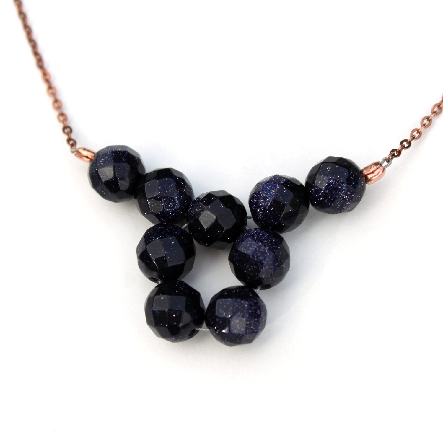 Sparkly, faceted navy goldstone 9 stone necklace