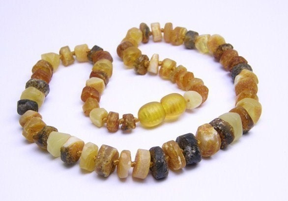 Tube Beads multicolored amber teething necklace for your baby, one of a kind design.