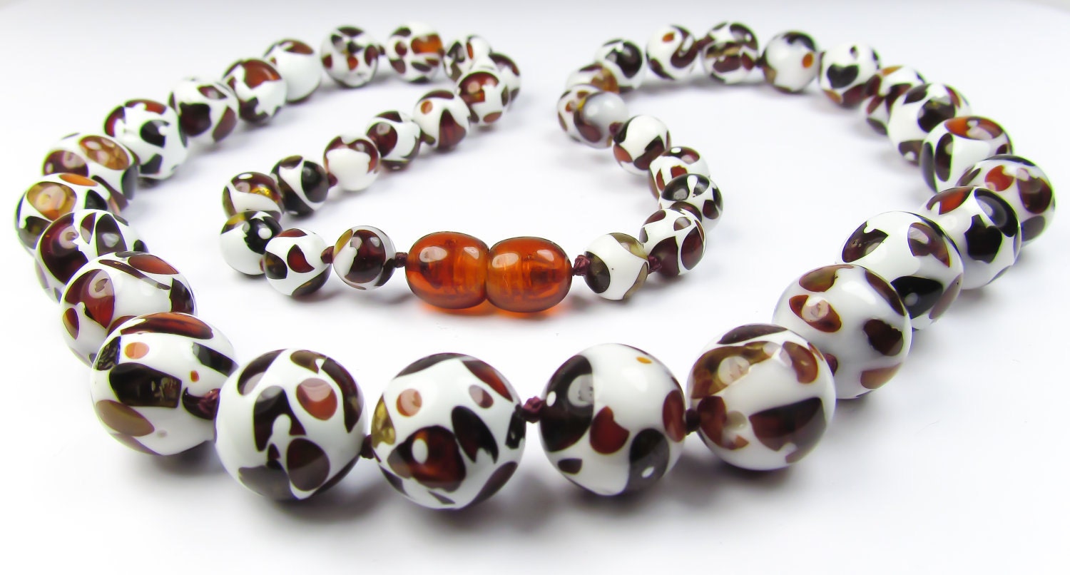 Mosaic amber teething necklace in rounded beads