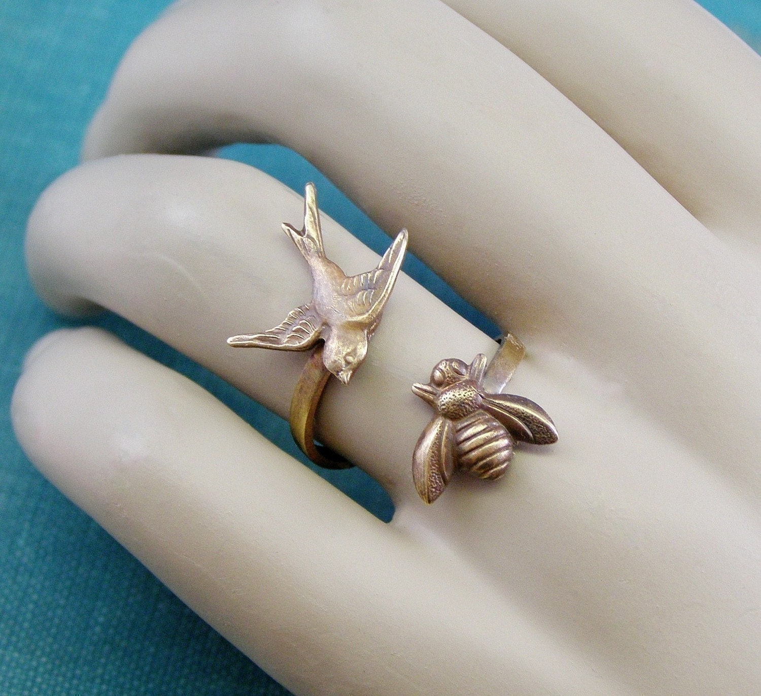 Bird ring with bee brass oxidized wrap