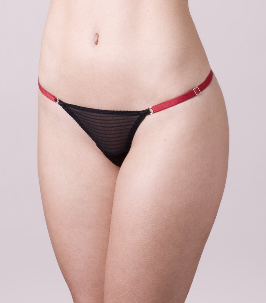 Adjustable Thong made in tulle with red endings