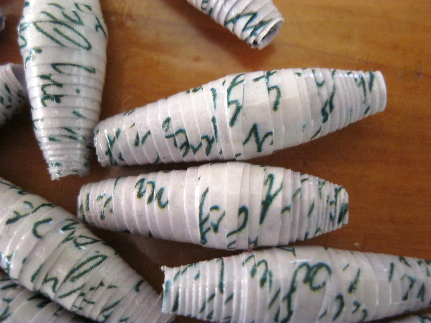 Green and white paper beads