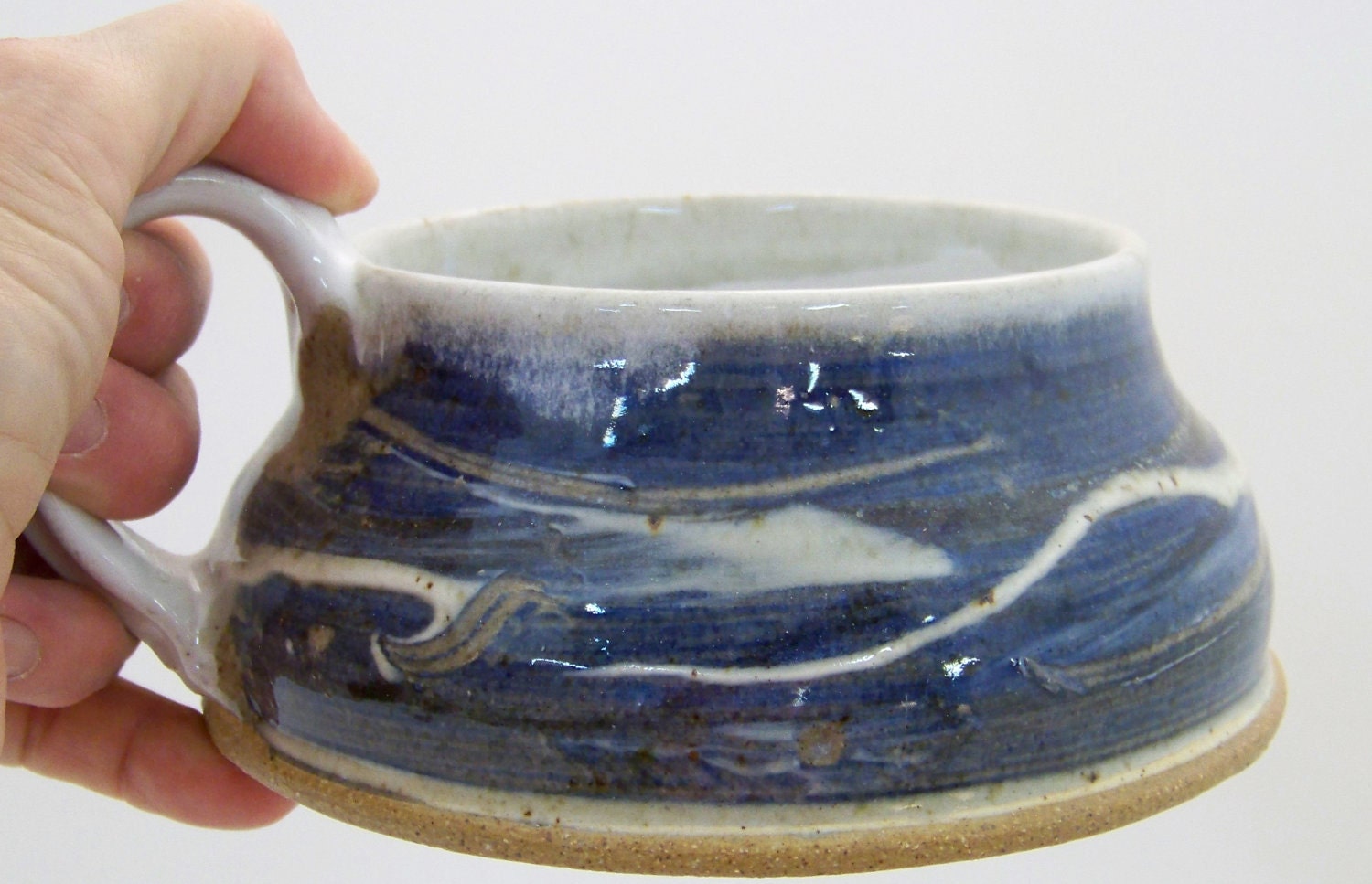 Hand-thrown Stoneware Soup Mug in a Brilliant cobalt blue glaze with gold and white highlights.