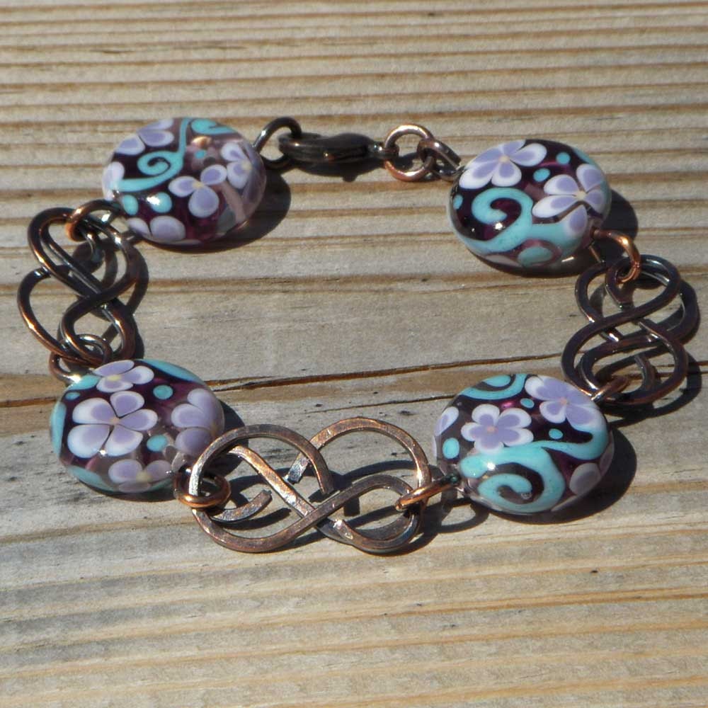 Celtic Knots... lampwork tabs and copper bracelet