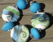 Handmade lampwork set in blue and green...."Cool Sensations"
