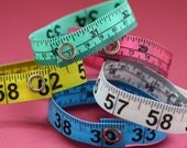 Five Pack of Tape Measure Bracelets in Various Colors
