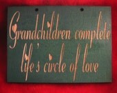 Wooden sign Grandchildren complete life's circle of love