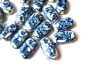 7 Ceramic porcelain beads, hand painted vintage  white with blue  design. rectangle