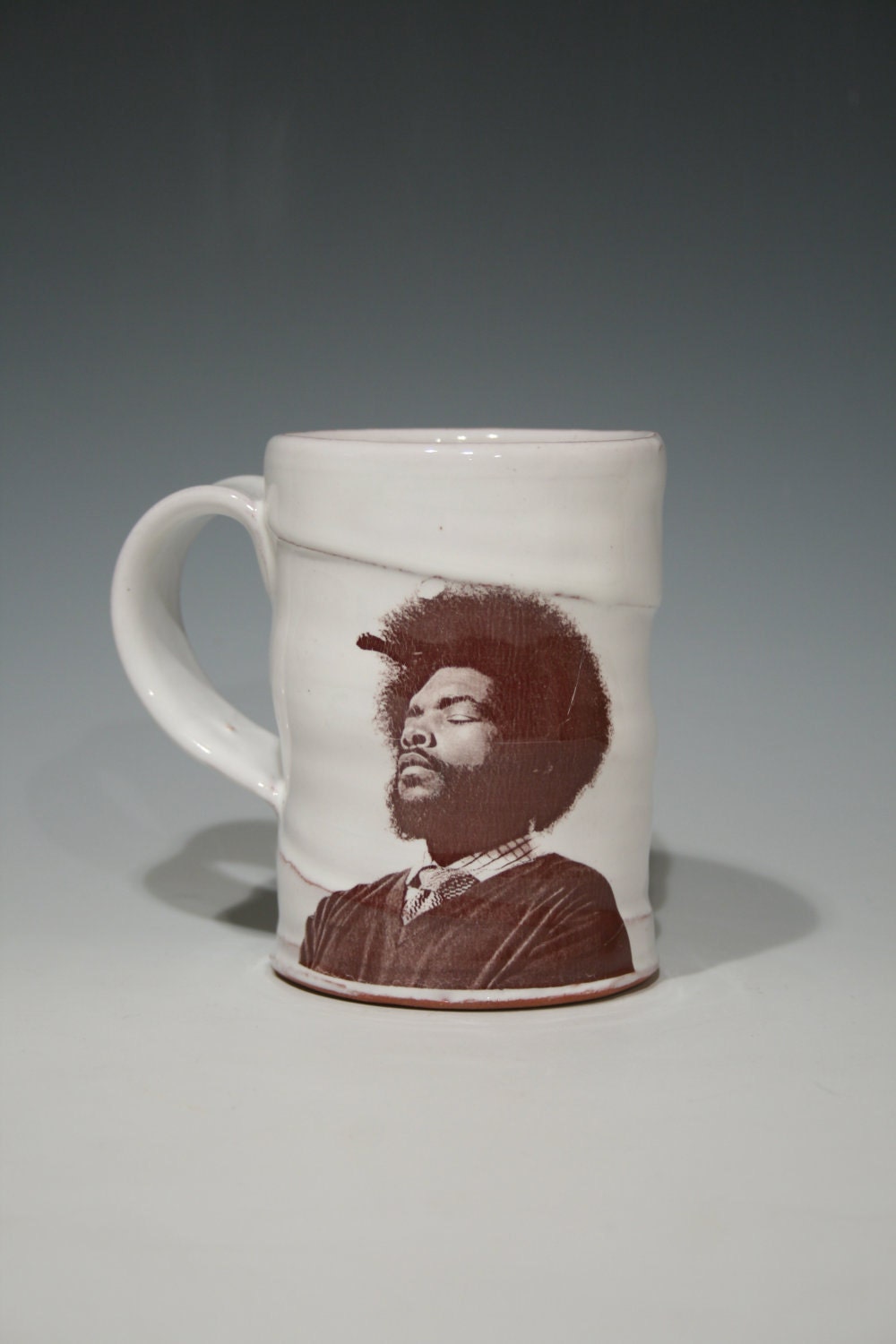 Handmade Questlove mug with white glaze