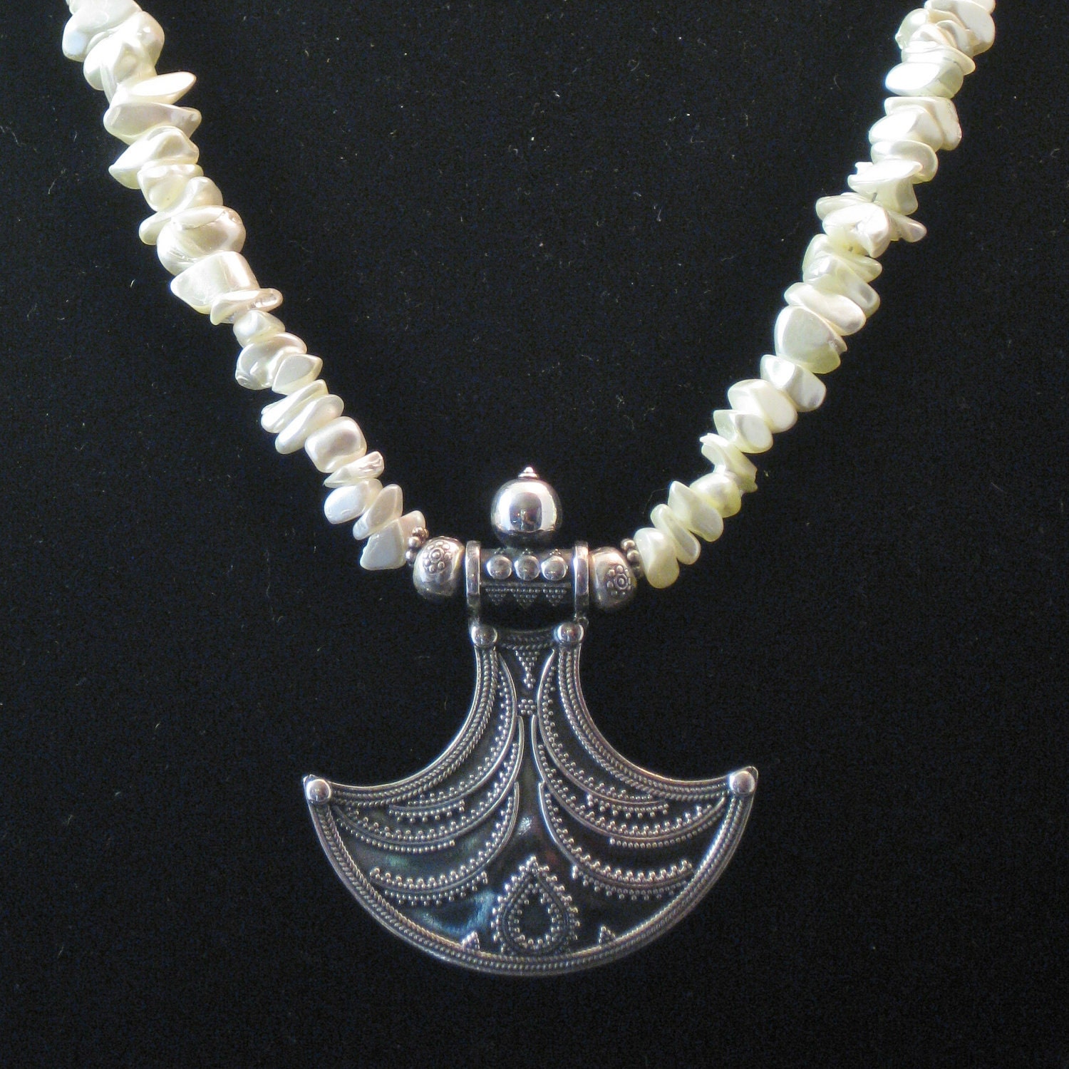 Necklace: sterling silver Indian pendant and mother of pearl