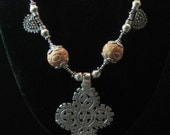 Neclace: Ethiopian Coptic cross with telsum prayer and carved ceramic beads