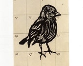 Bird LInocut Print on Calendar Page