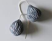 Carved pods in pale blue