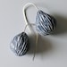 Carved pods in pale blue