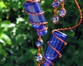 Set of 2 Little Blue Spirit Bottles With Copper Wire Wrapped Iridescent Blue Glass Marble Prisms, Garden Decor